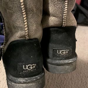 UGG BOOTS, worn very few times. They are a brownish/ greyish with black accents.